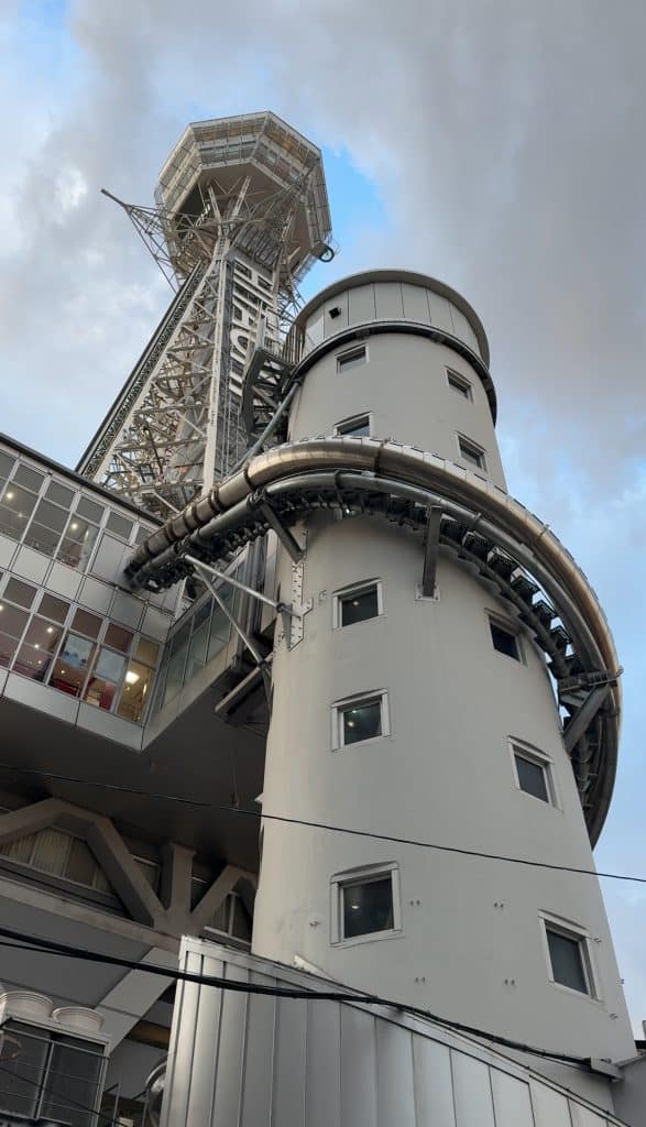 Slide down the Tsutenkaku Tower